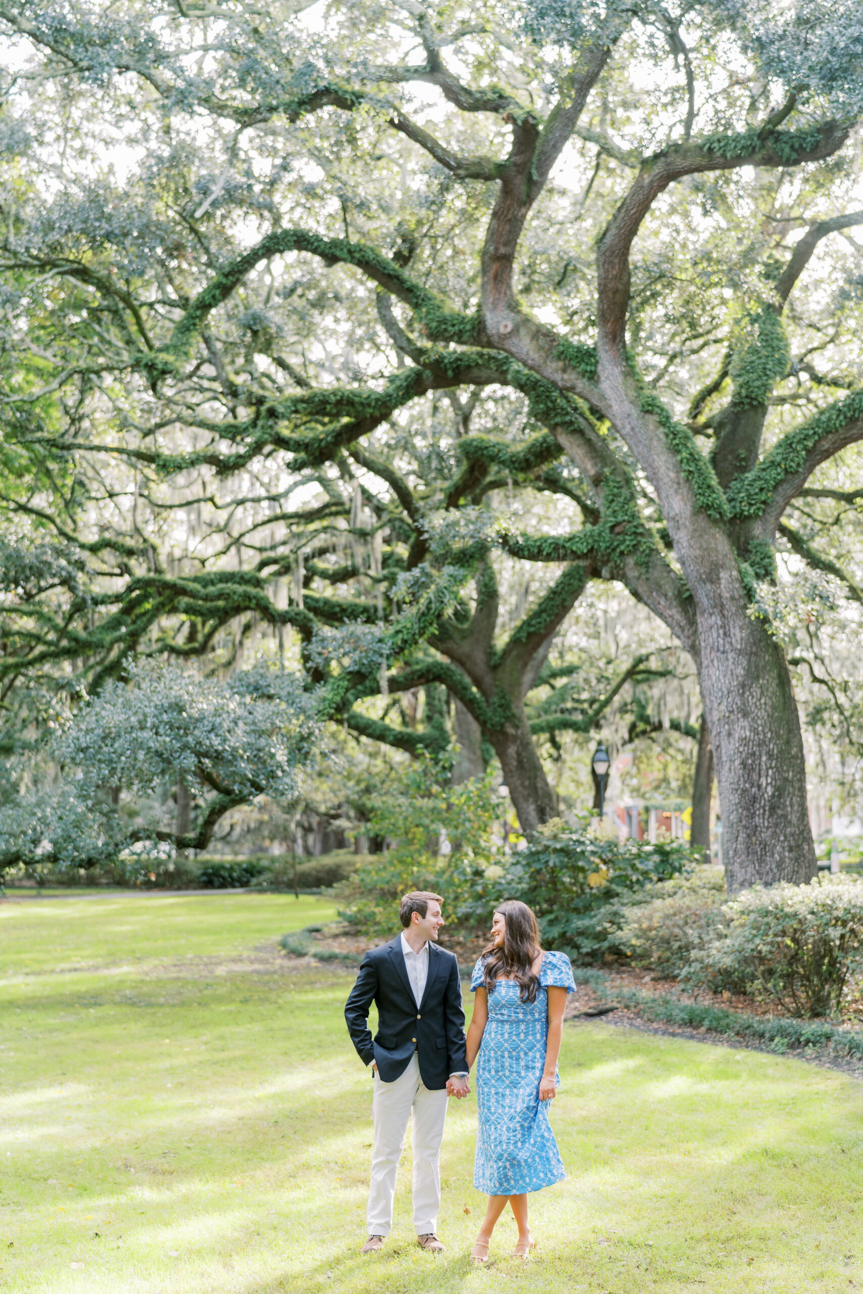 Engagement session in downtown Savannah GA in Forsyth Park. engagement photos under the oaks.